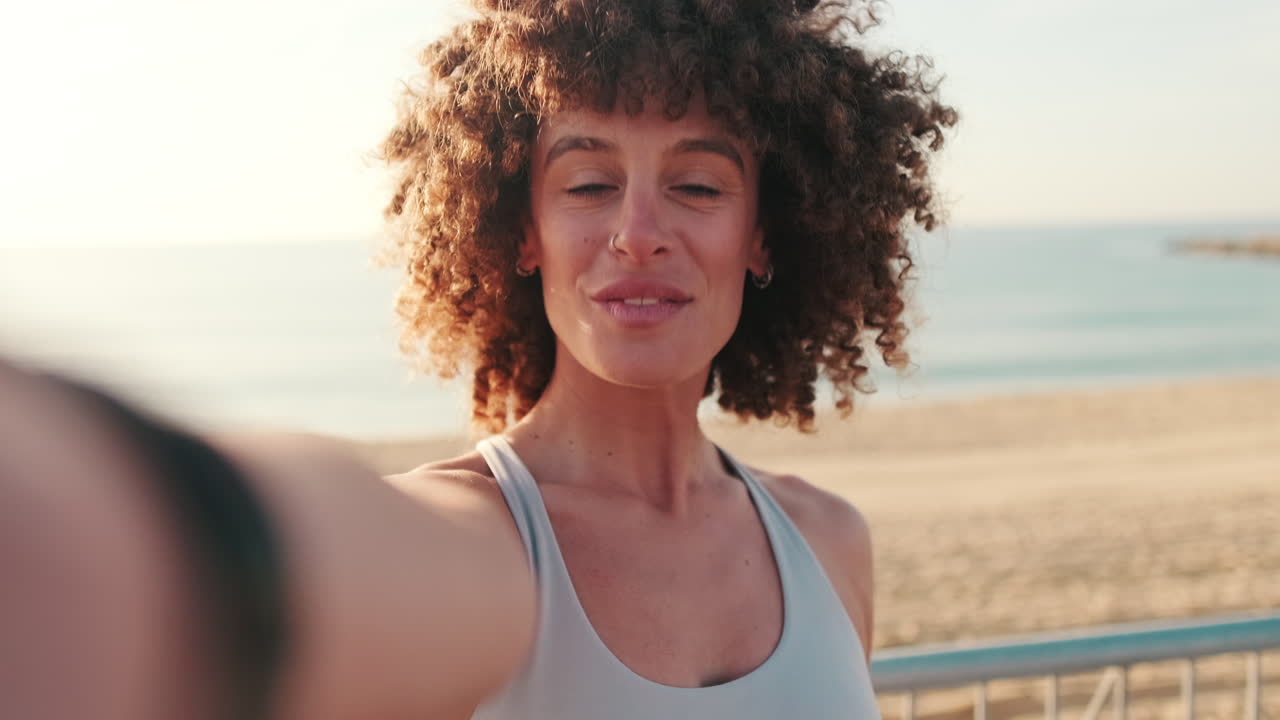 Happy Woman's Beach Selfie After Workout