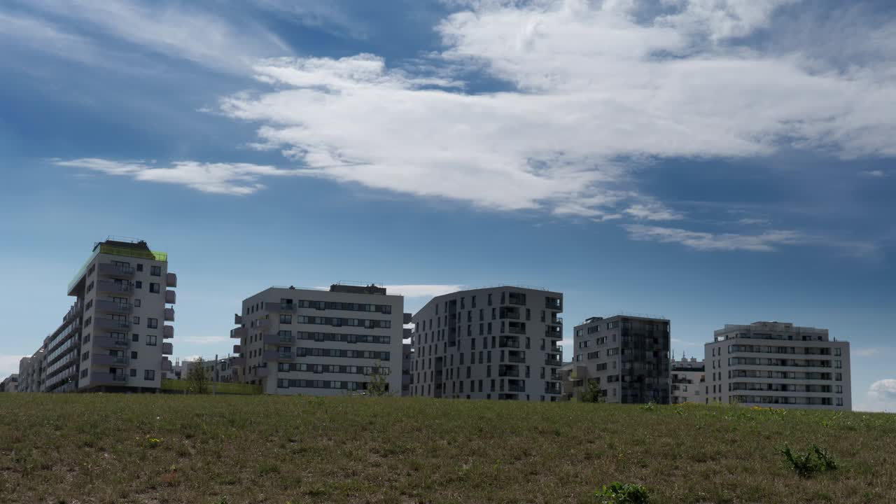 4K Looping Clouds above Buildings Time Lapse