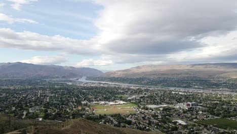 scenic aerial panorama of wenatchee, usa and cascade range in background