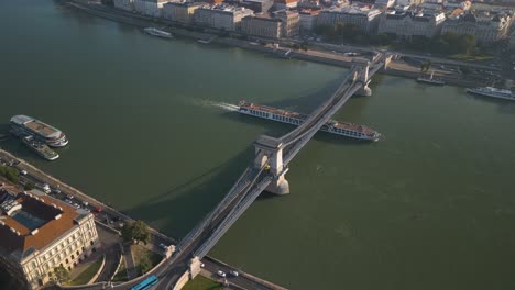 high aerial view above szechenyi chain bridge in budapest, hungary