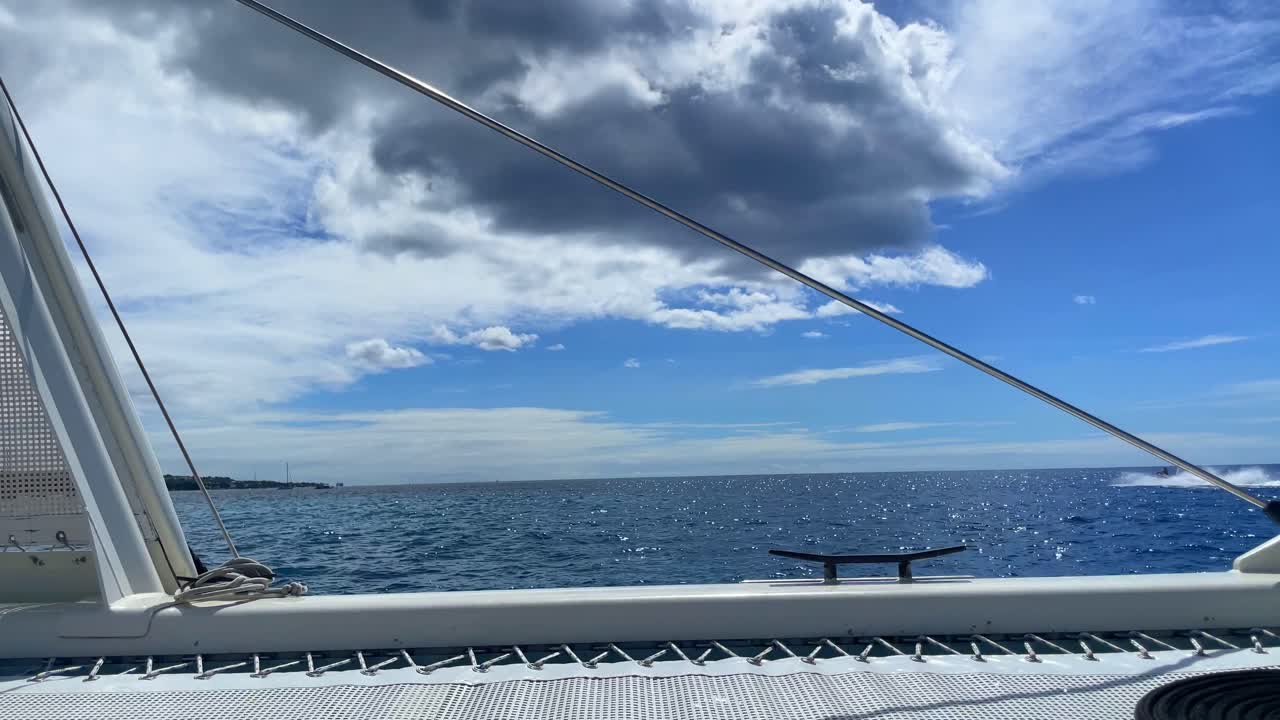 Ocean horizon off the side of catamaran, Barbados 2025 UHD