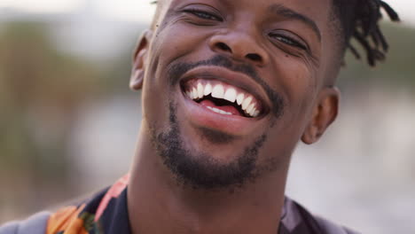 black man, portrait and laughing face outdoor