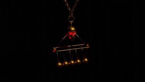 golden skull pendant with pendulum