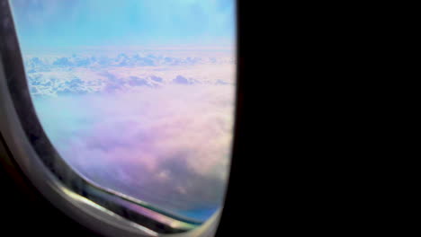 stunning view from airplane window: flying above a sea of clouds
