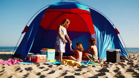 family camping on the beach