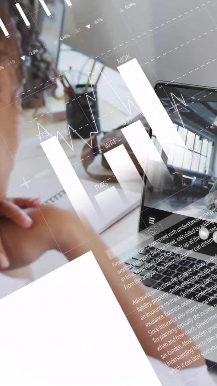 Vertical video: Woman looking at laptop, causing pie and bar charts moving across desk for business