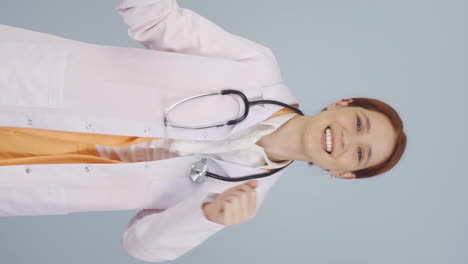 Vertical-video-of-Dancing-doctor.-Happy-and-cute.