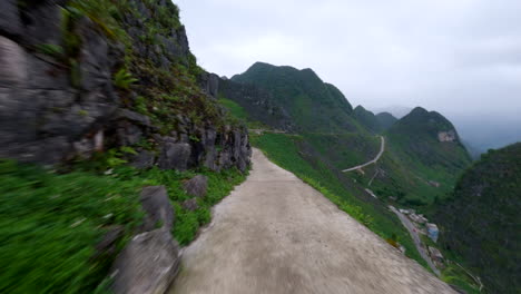 driving on a winding mountain road in vietnam
