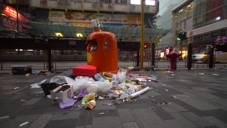 overflowing rubbish bin on hong kong street