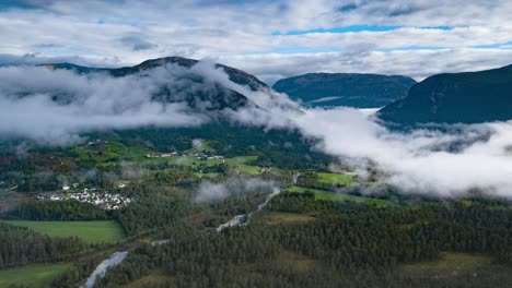 clouds slowly crawling over the valley of the otra river