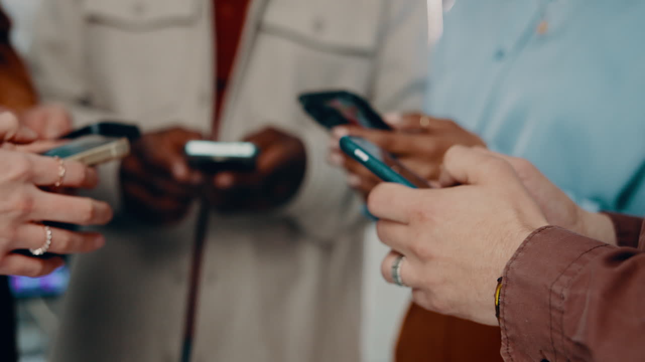 Group of people using smartphones