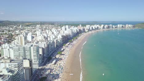 Static-aerial-shot-of-Praia-do-Morro-beach-in-Guarapari,-Espirito-Santo,-Brazil