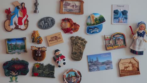 animation of souvenir magnets on a refrigerator