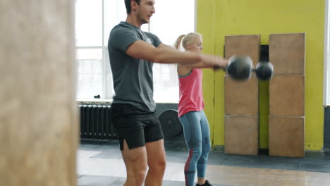 couple weightlifting exercise session in gym