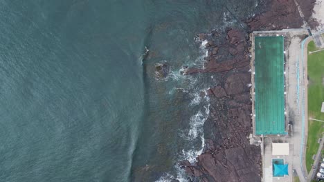 unique swimming pool located in a small coastal seaside town