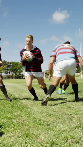 rugby player running and holding ball 4k 4k