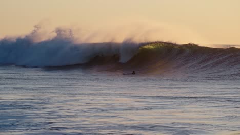 beautiful slow motion slo mo ocean waves crashing and breaking off the sea shore in hawaii