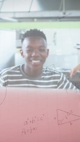 animation of mathematical equations over school children using laptop in classroom
