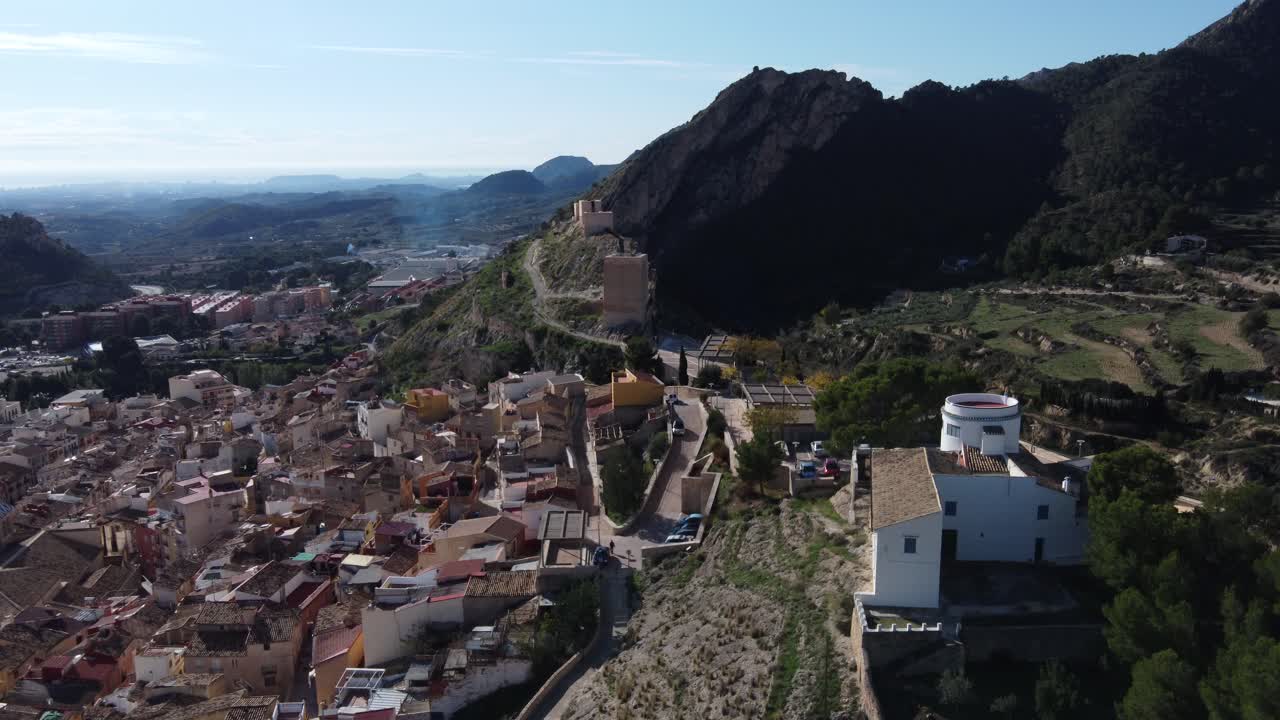Aerial view of the village of Jijona, Spain. Sea in the background.