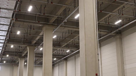 interior pillars and ceiling in large distribution warehouse