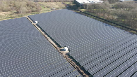 Aerial-overview-of-large-solar-panel-field-on-a-bright-sunny-day-in-autumn