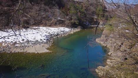 beautiful vibrant mountain river in gifu prefecture mountains, shirakawago