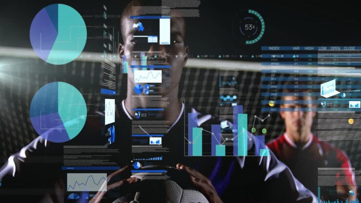 Holding soccer ball with data analytics animation, players standing on field