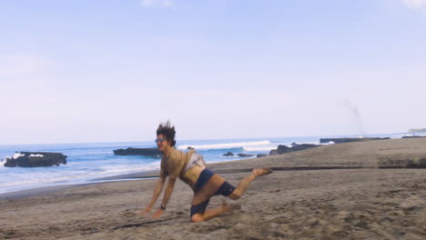 Man-playing-beach-volleyball.