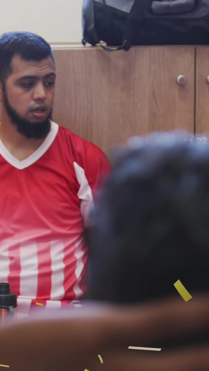 Animation of confetti falling over male football players in changing rooms