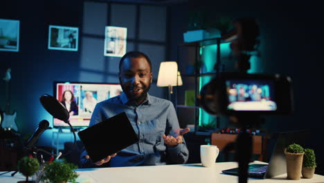 influencer reviews tablet in studio