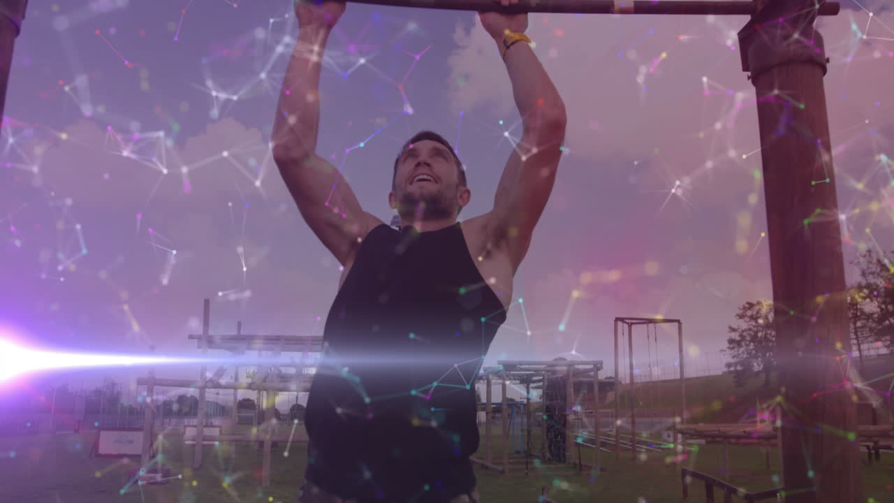 Man doing pull-ups on outdoor bar with digital network animation overlay