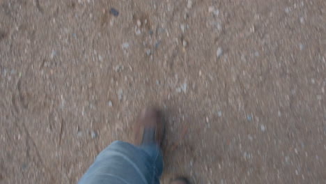 man hiker boots walking on a path