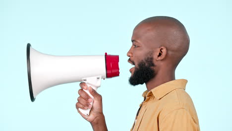 speaker, megaphone and a man talking in studio