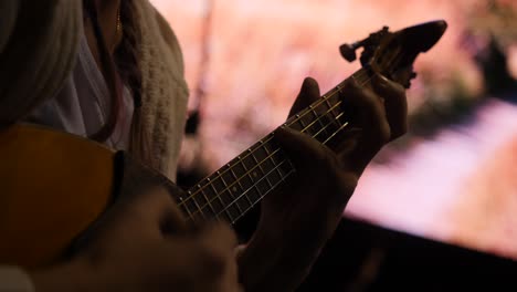 person playing guitar