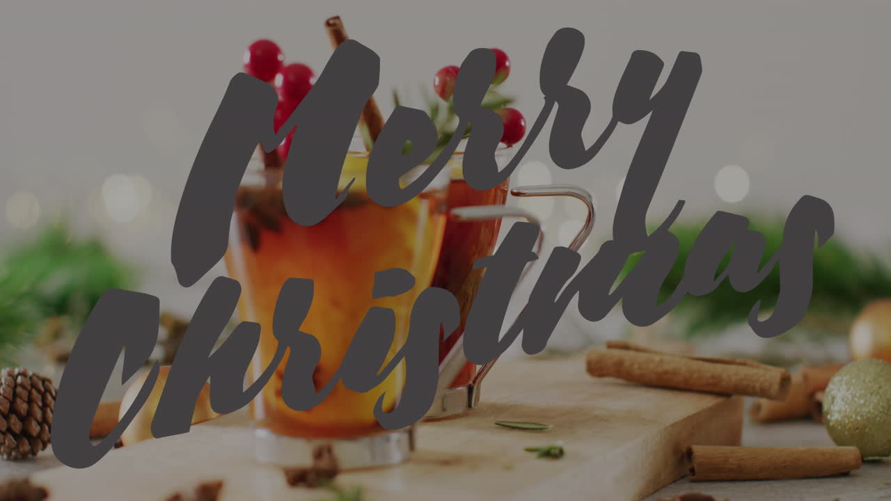 animación de saludos de navidad texto sobre bebidas y decoraciones de navidad.
