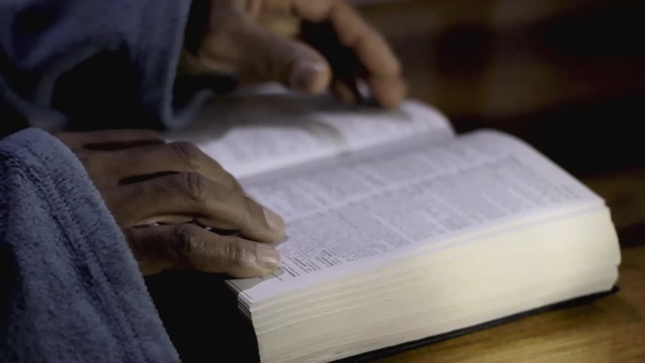 praying to God with bible faithfully worshipping with people stock footage stock video