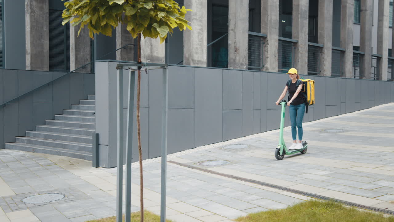 Woman on Electric Scooter Delivering Food