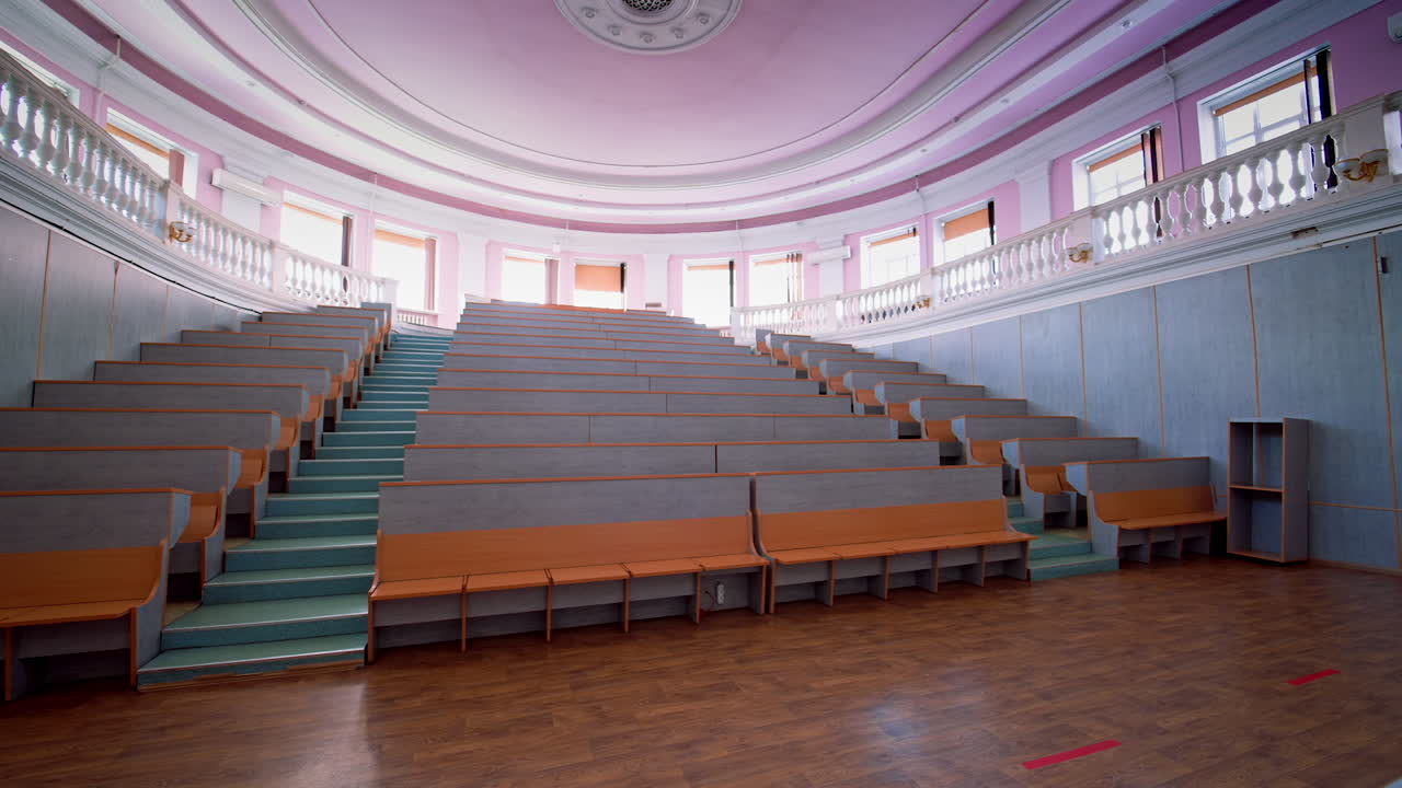 An empty lecture hall in a University. Interior of contemporary lecture theater in university campus