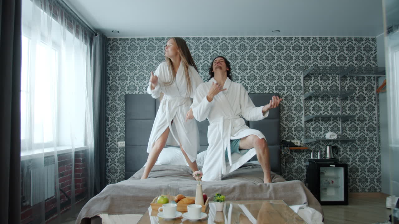 Couple Dancing in a Hotel Room