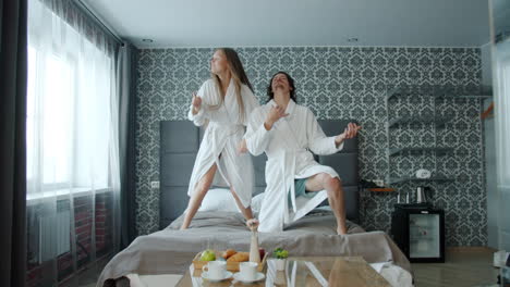 couple dancing in a hotel room