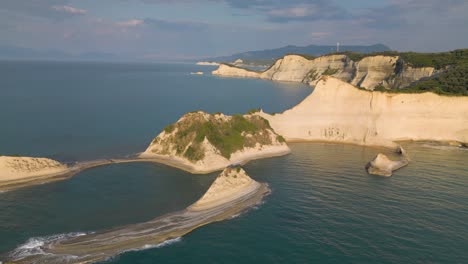 incredible drone shot above cape drastis, greek ionian island of corfu