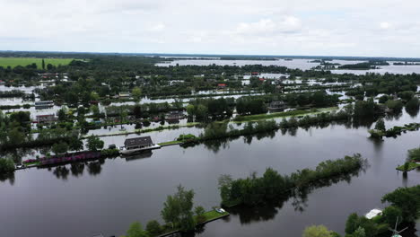 fly over narrow elongated islands at scheendijk hamlet in north holland, netherlands