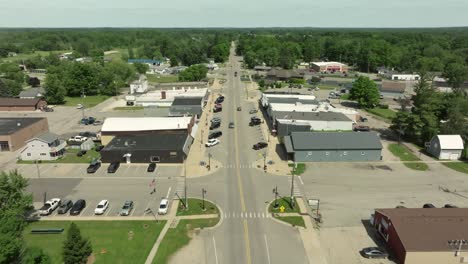 sand lake, michigan downtown with drone video moving in low