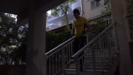 Man-leaving-hotel-to-have-workout-on-water-front