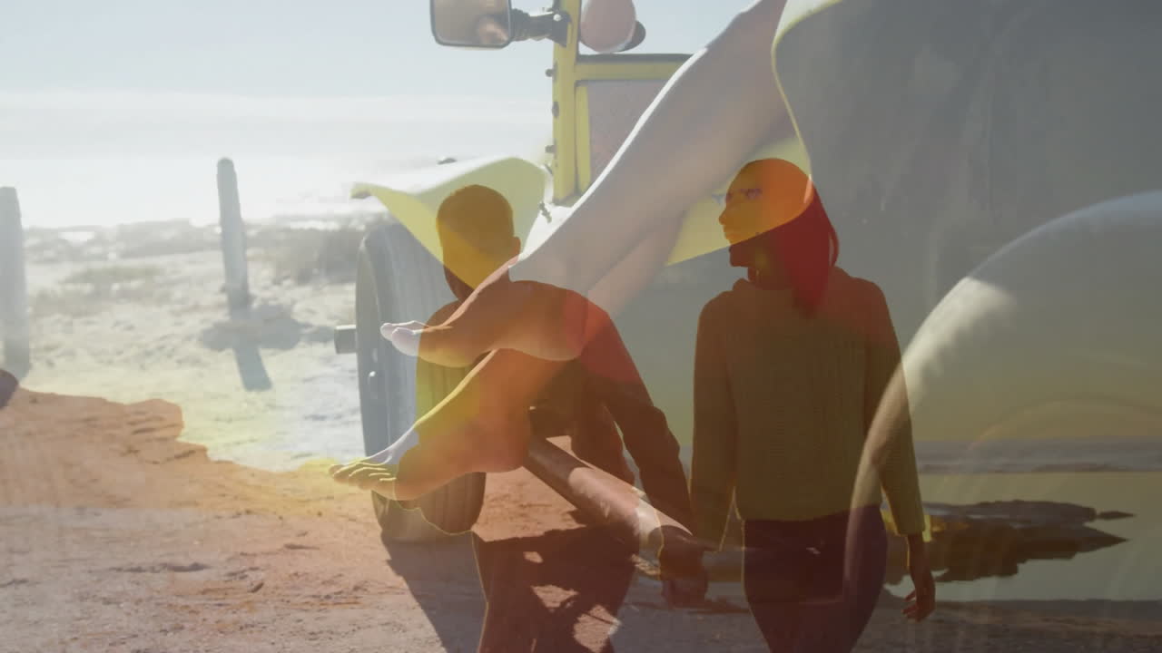 Walking on beach, couple holding seashell with animation of yellow vehicle