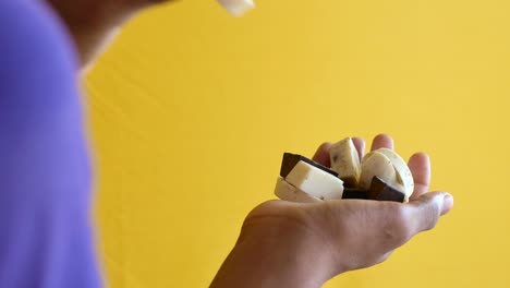 Rear-view-of-hand-pick-dark-chocolate-,