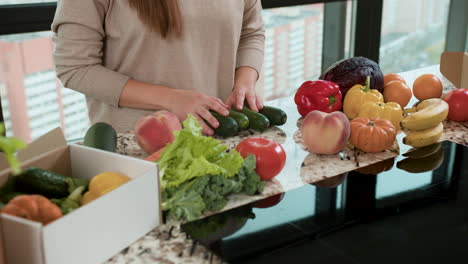 Woman-sorting-vegetables