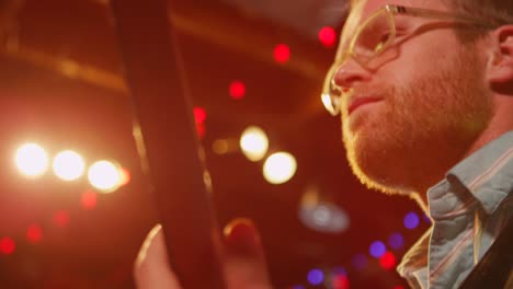 Closeup-of-a-guitarist-playing