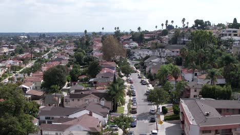 Baldwin-Hills-residential-neighborhood,-house-in-a-community,-aerial-during-cloudy-day