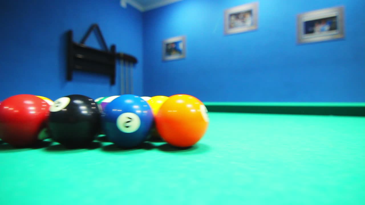 Colorful billiard balls on pool table. Billiards pool game. Billiard table